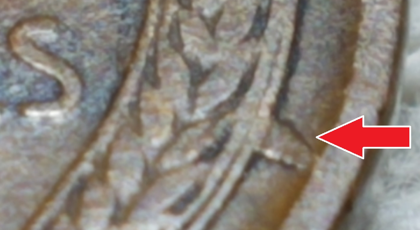 1909-Lincoln-Cent-With-A-Raised-Metal-Bridge-Connecting-Wheat-To-Rim