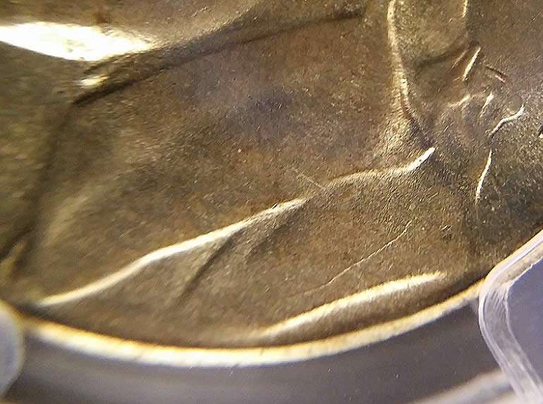 Post-A-Coin-Or-Medal-With-A-Die-Crack!