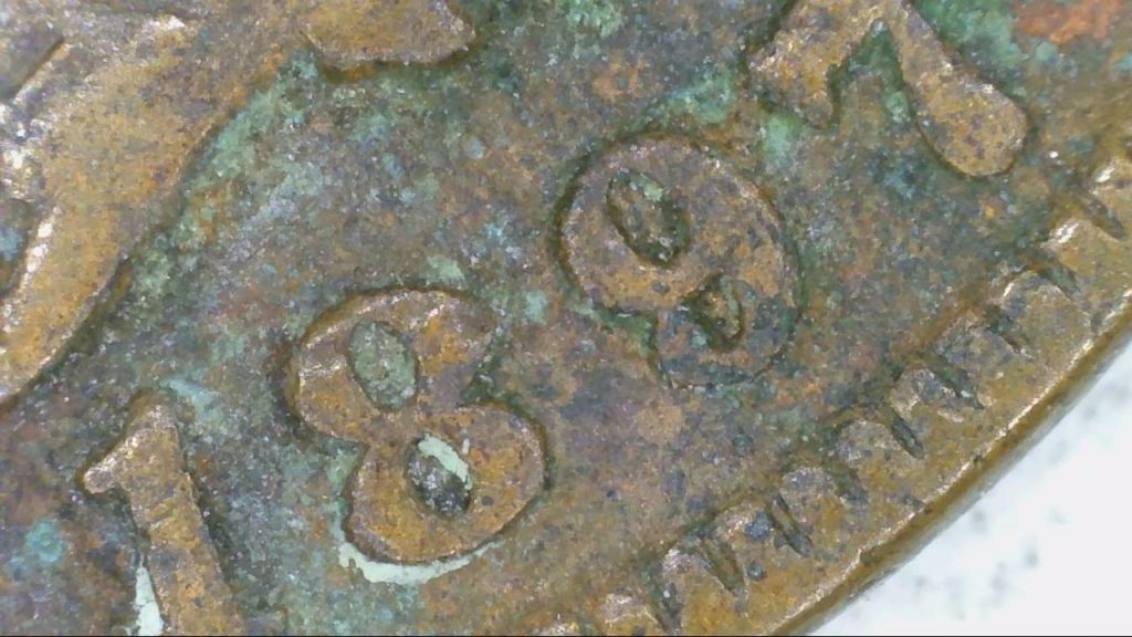 Does-This-1897-Penny-Have-The-9-In-1897-Over-Another-Number?