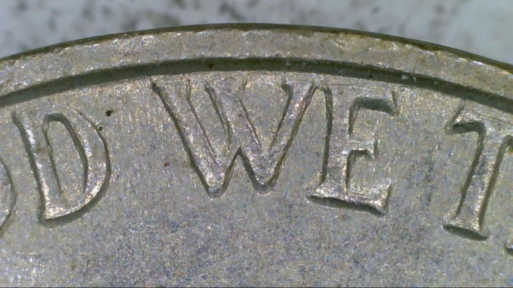 Does-This-1964-Nickel-Have-Doubling-On-The-Front-'God'-And-'Monticello'-On-The-Back?