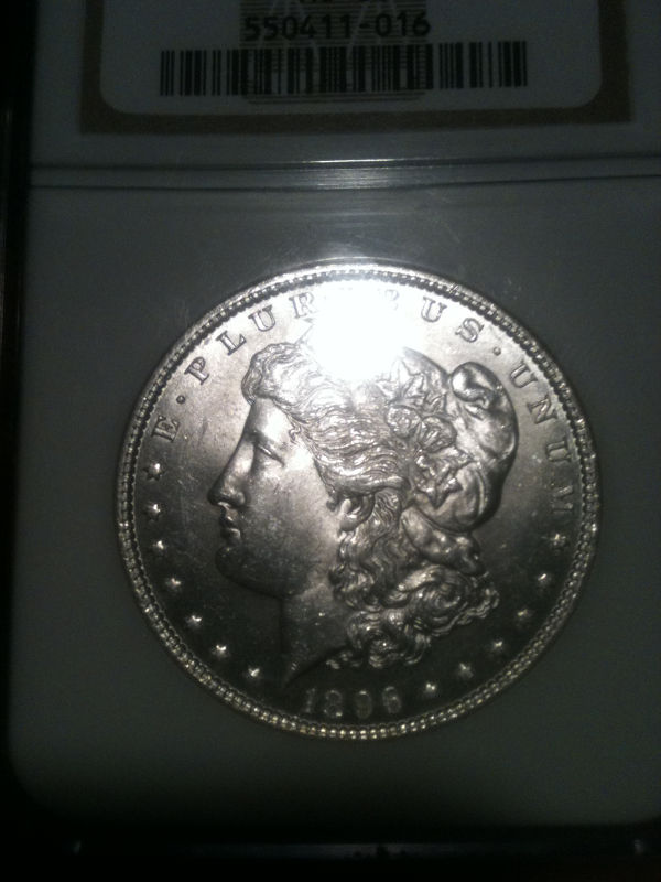 Need-Help.--Wondering-If-I-Got-A-Fake-Graded-Coin