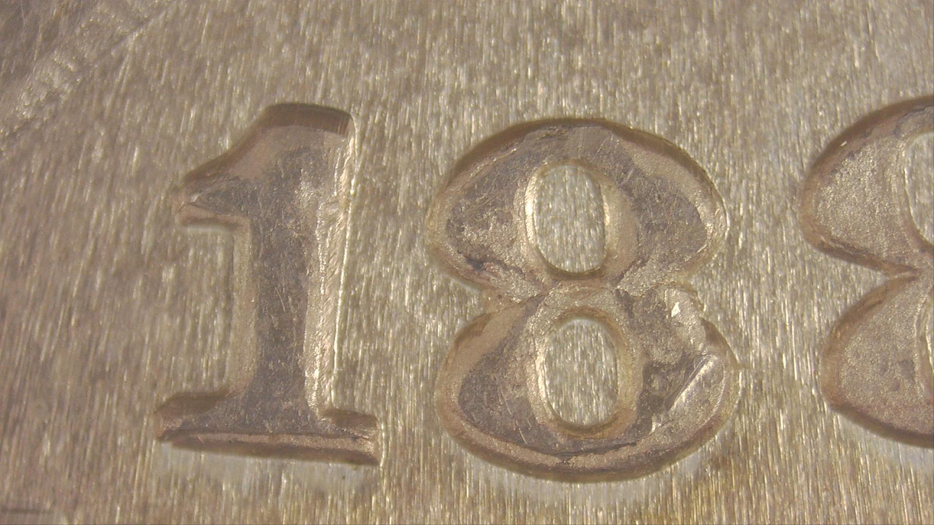 1880-S-Morgan--With-A--Repunched-Date