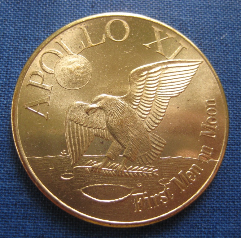 Post-A-Coin-Or-Medal-Related-To-Space-Travel.