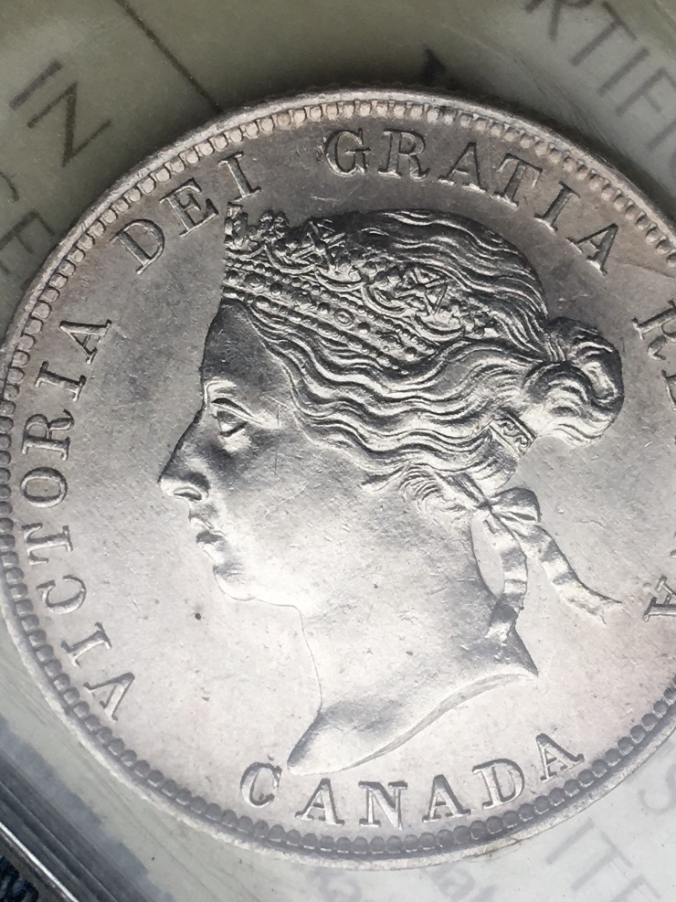 Scratch-On-An-MS-Coin