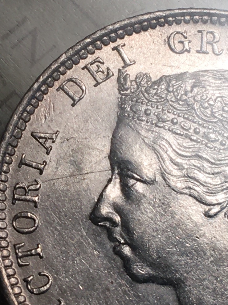 Scratch-On-An-MS-Coin