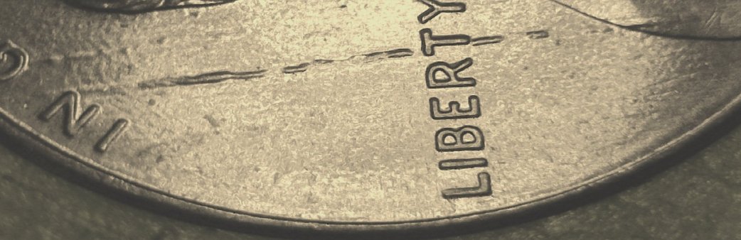 1993-One-Cent-Stike-Through-Debris?