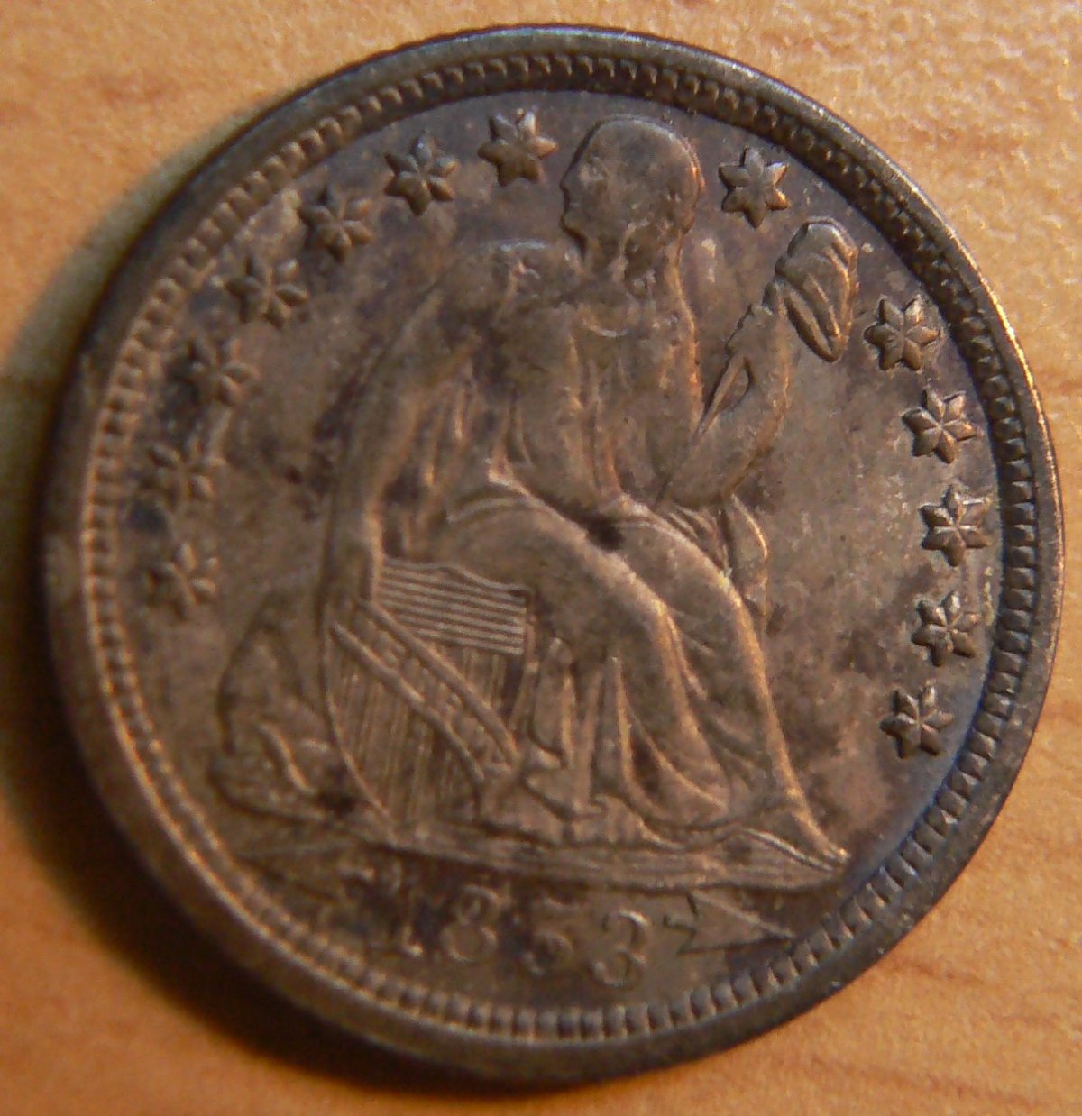 Seated-Liberty-Dime-1853-O---Severely-Discolored