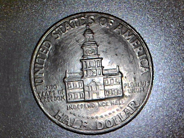 1976-Kennedy-Half-Dollar-Struck-Through-Grease?