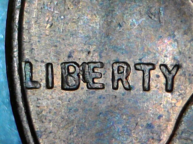 1957-D-Bie,-Plus-Struck-Thru-Debris,-Plus-Lamination,-Plus-Struck-Thru?