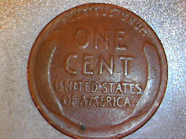 1925-D-Wheat-Penny-With-Unexplained-On-Bottom-Of-Obverse
