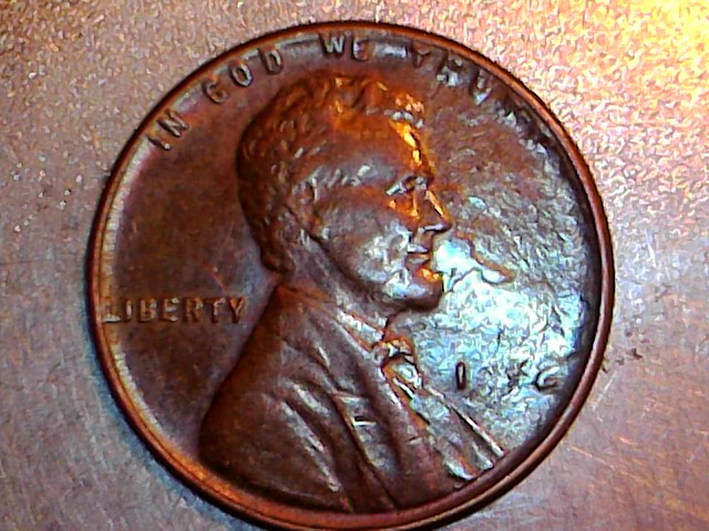 1952-Lincoln-Wheat-Strike-Thru,-Lamination-Or-Damage?