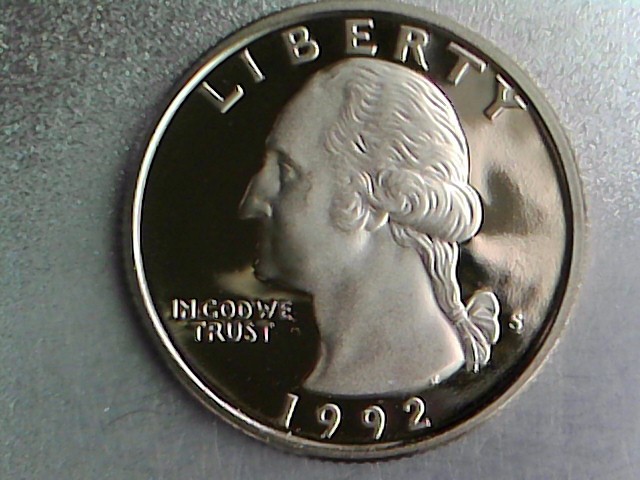 1992-Proof-Quarter-With-Partial-Dropped-Letter?