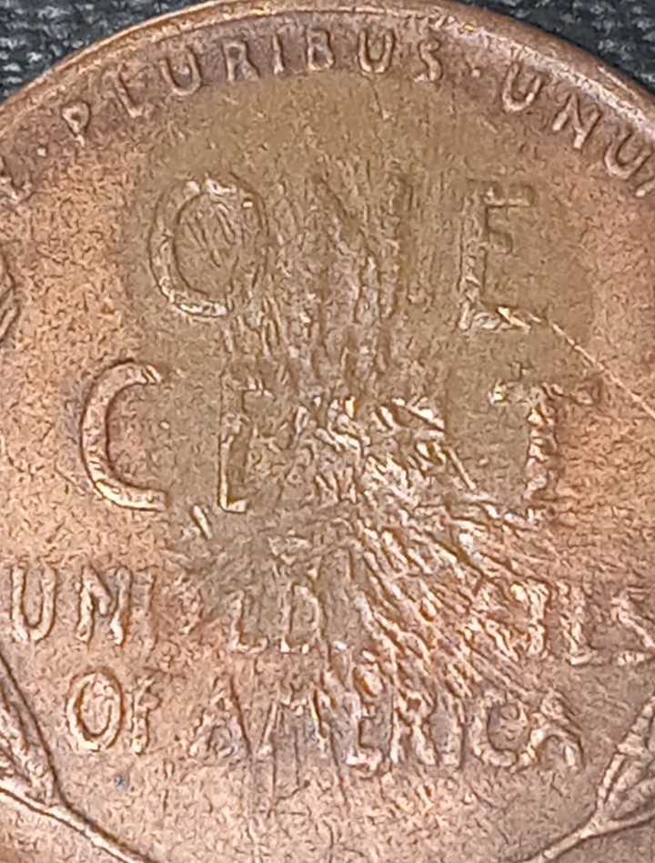 1955-D-Wheat-Penny-Looks-Like-Something-During-Mint-N-Some-After-Huh?