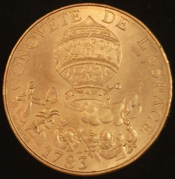 Post-A-Coin-Or-Medal-Related-To-Space-Travel.