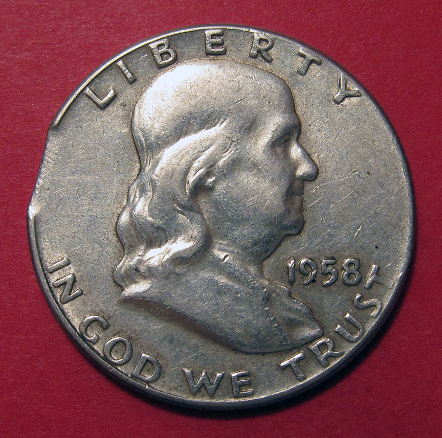 1958-Ben-Franklin-Half-Dollar-Clipped-Planchet