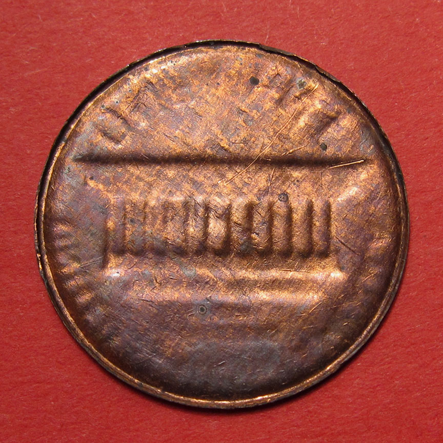 No-Date-Lincoln-Memorial-Cent-Mint-Error---Split-Planchet-Struck-Through-Planchet