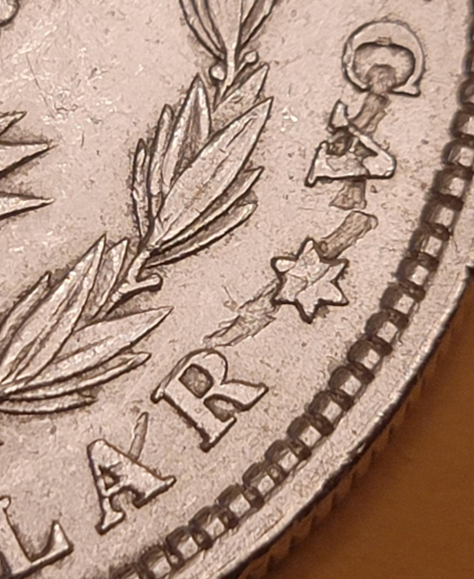 1879-O-Morgan-Silver-Dollar---Has-Anyone-Ever-Seen-A-Strike-Through-Like-This?