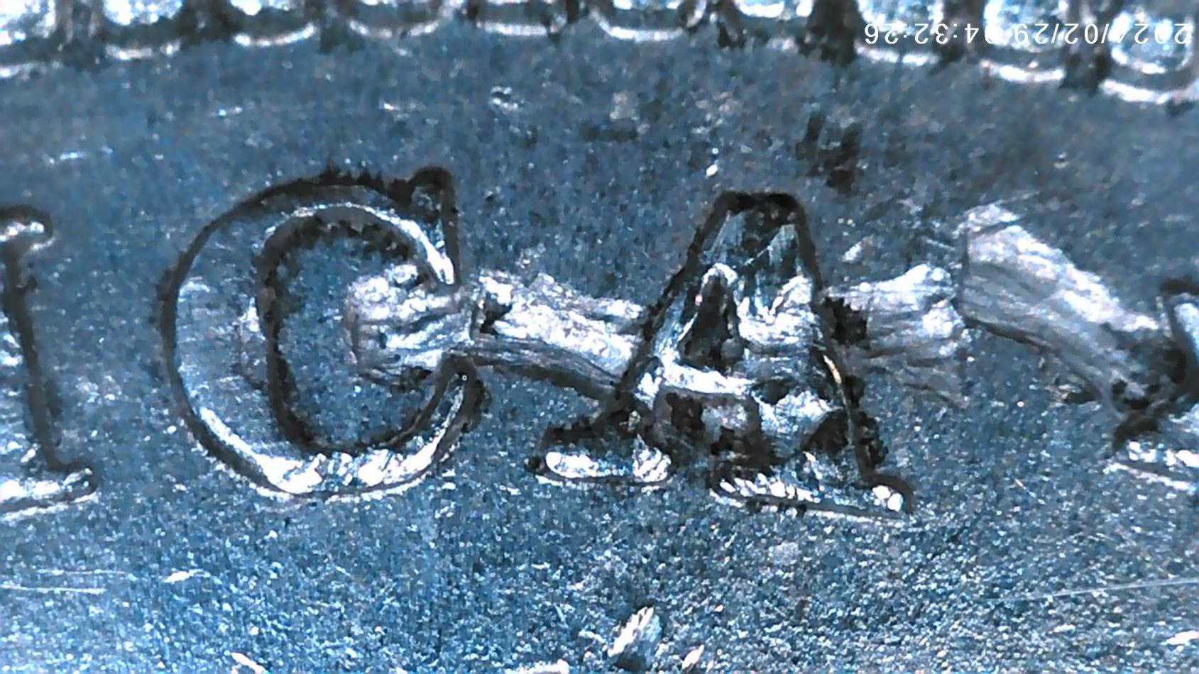 1879-O-Morgan-Silver-Dollar---Has-Anyone-Ever-Seen-A-Strike-Through-Like-This?