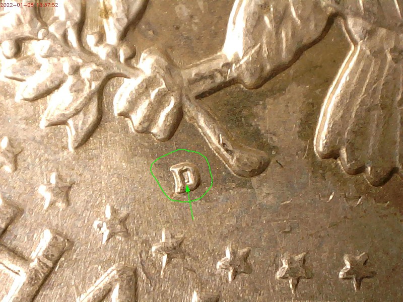 1964--D-1/2-Dollar-,RPM-Or-A-Well-Place-Die-Chip-?