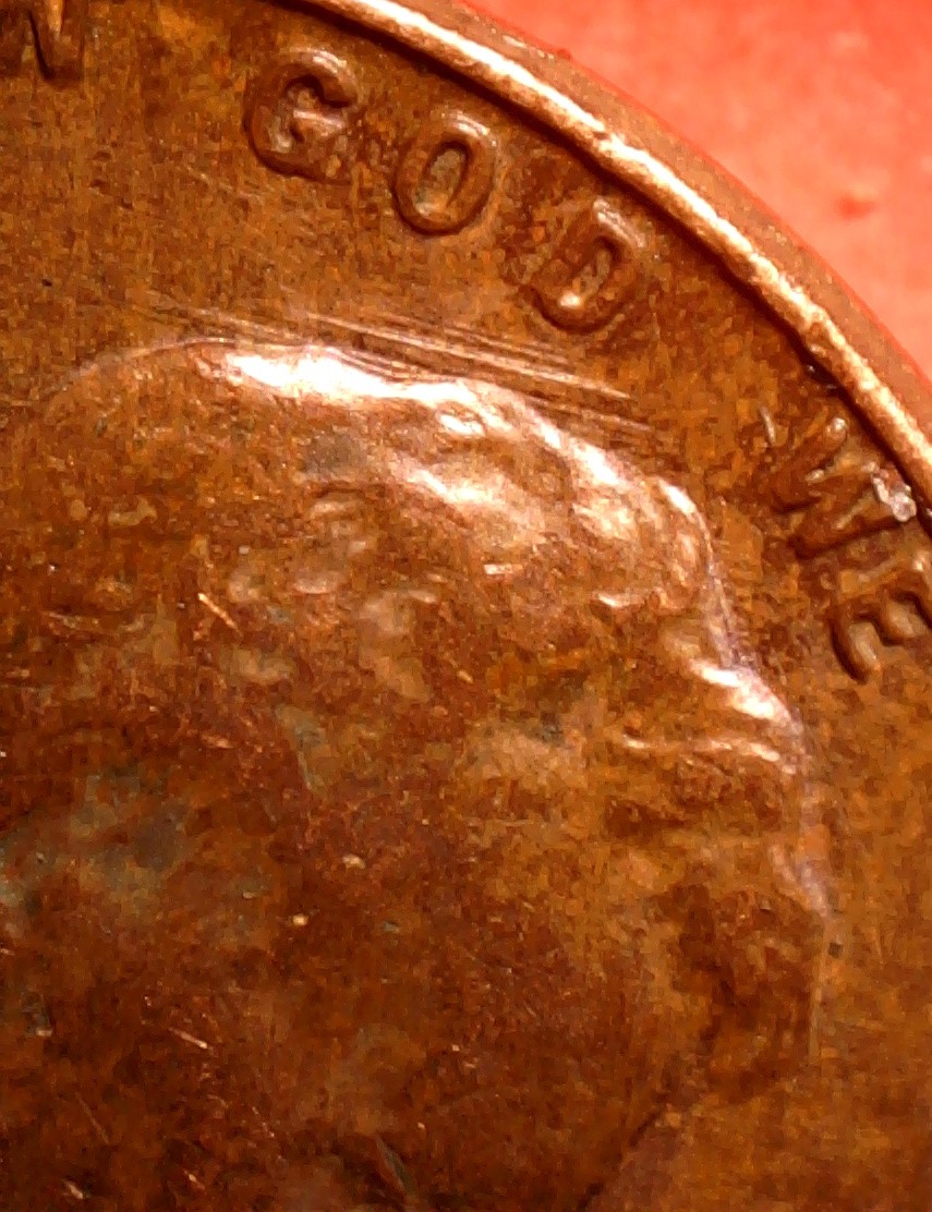 1957-D-Obverse-Feeder-Fingers?