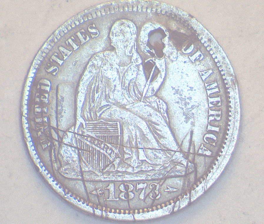 1873-CC-Dime.--How-Much-Does-Having-A-Hole-Punched-Through-Your-Coin-Ruin-The-Value?
