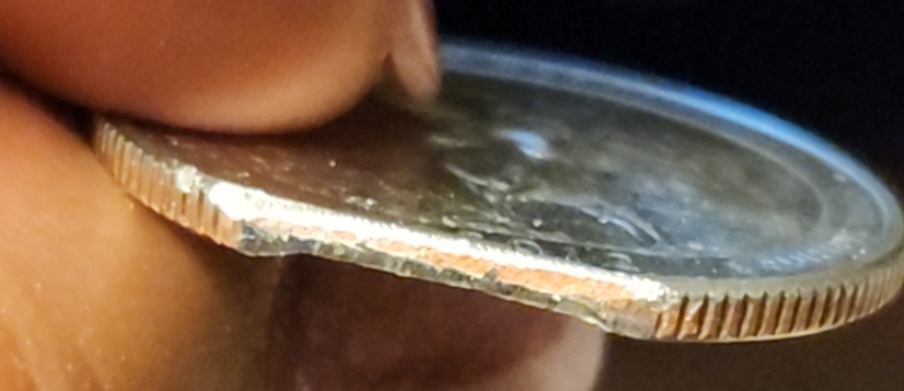 2012-Quarter-With-Cut-Off-Edge