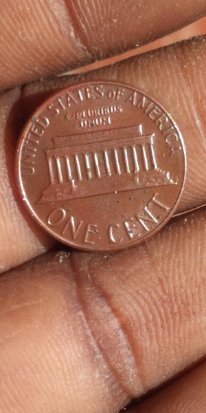 1985-Penny-Dark-Color-With-Small-Black-Dots-Is-That-Normal