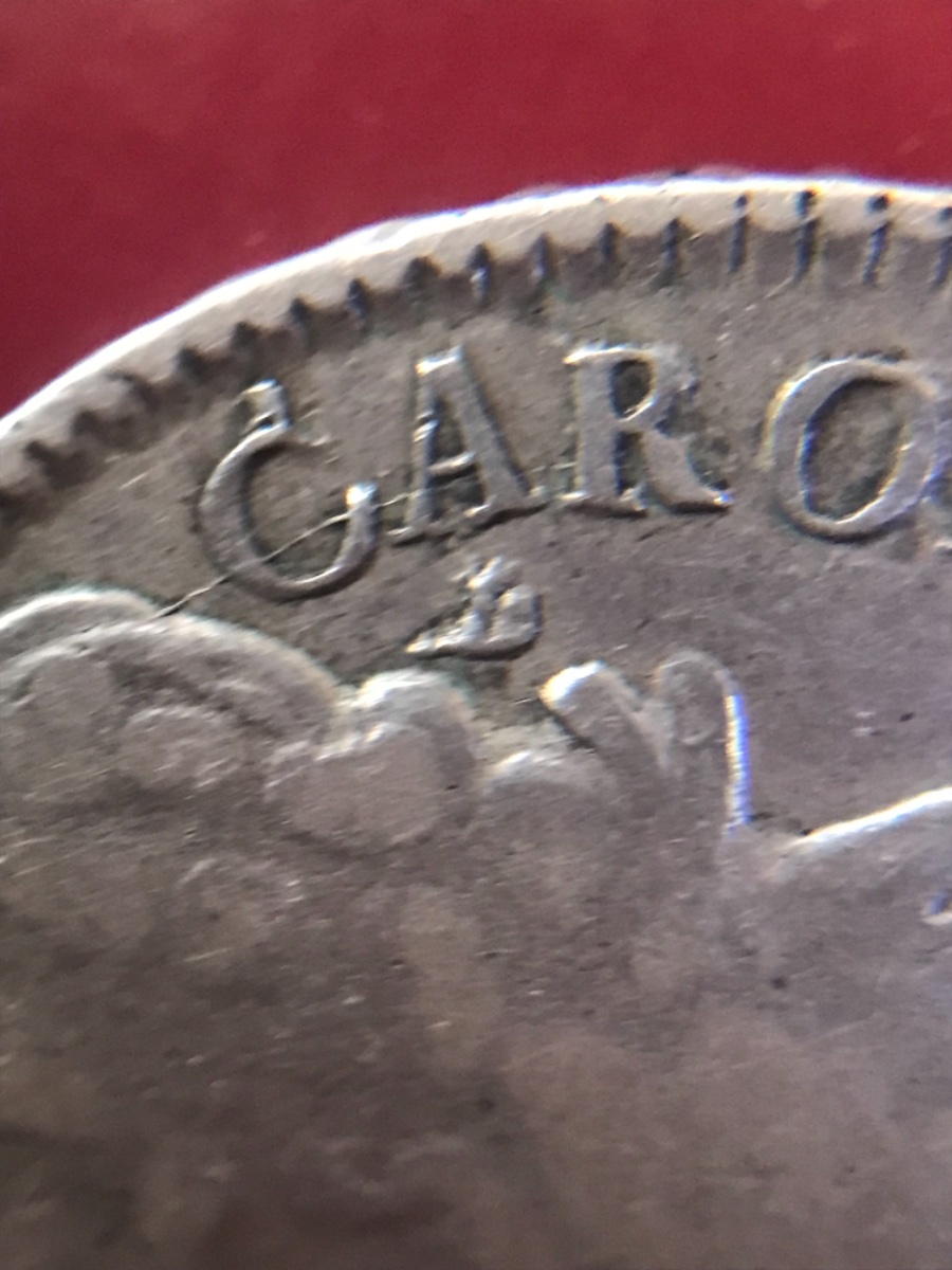 Is-This-An-Error-Or-A-Mark-In-1676-Coin?