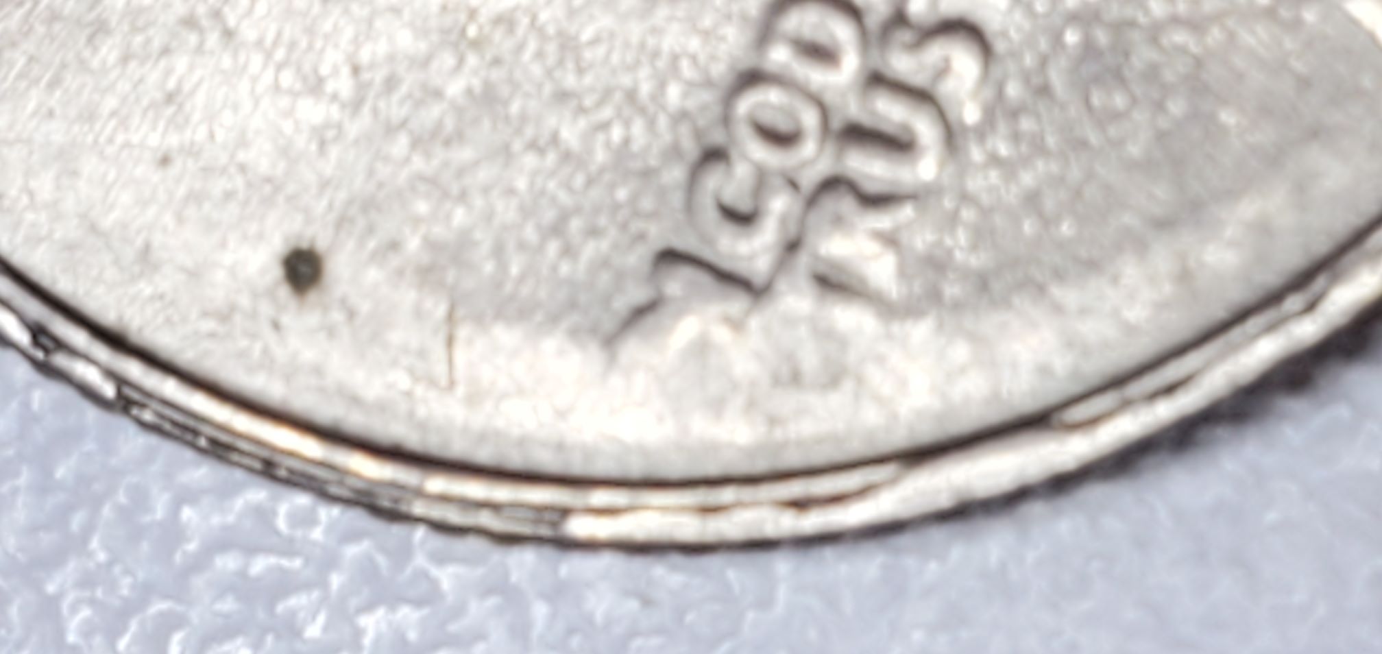 1983-P-Quarter-Strike-Through-Or-Dryer-Coin-Or-Worn-Die?