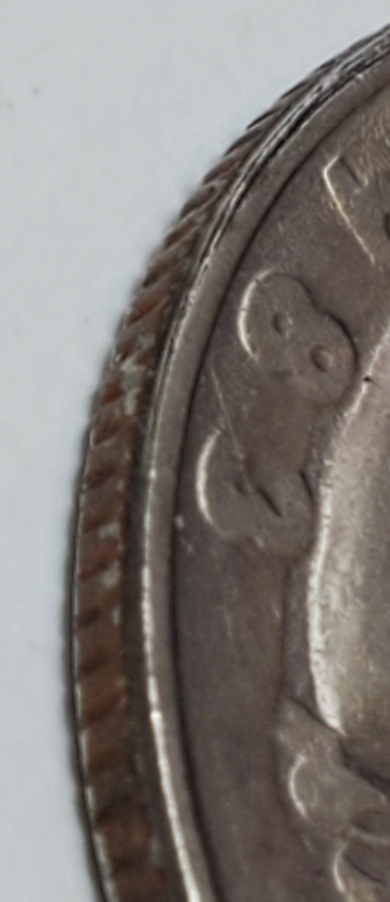 1983-P-Quarter-Strike-Through-Or-Dryer-Coin-Or-Worn-Die?