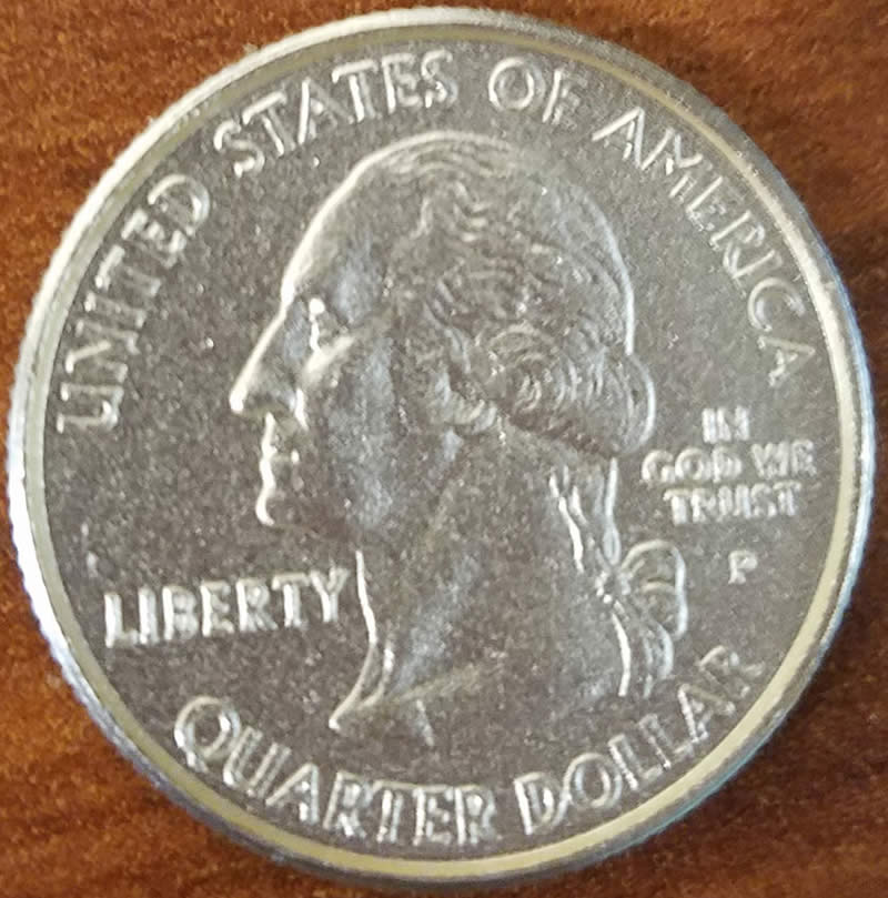 2000-Maryland-State-Quarter-With-Odd-Yellow-Tint-And-Plastic-Coating