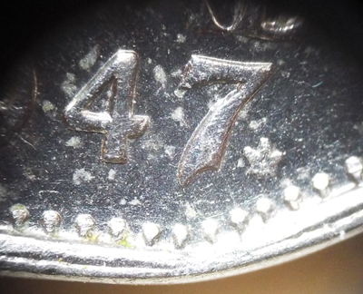 1947-Nickel-With-Re-Punched-7-Not-Just-Once,-But-Three-Times?