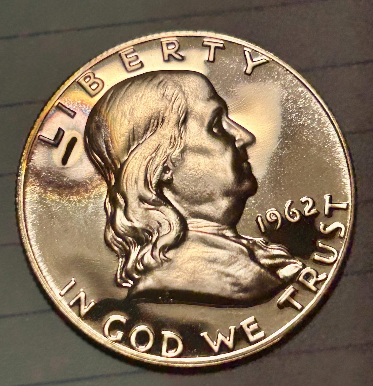 1962-Proof-50-C-With-Weird-Toning-Mark?
