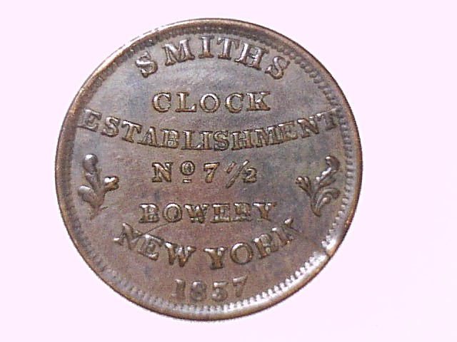 Smith's-Clock-Hard-Times-Token-With-An-Incomplete-Punch-Error