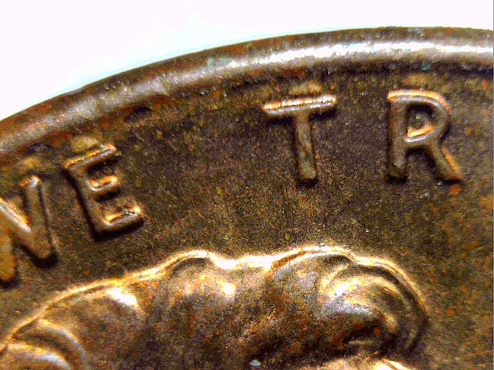 1987-LMC-With-Raised-Bars-Above-Letters?