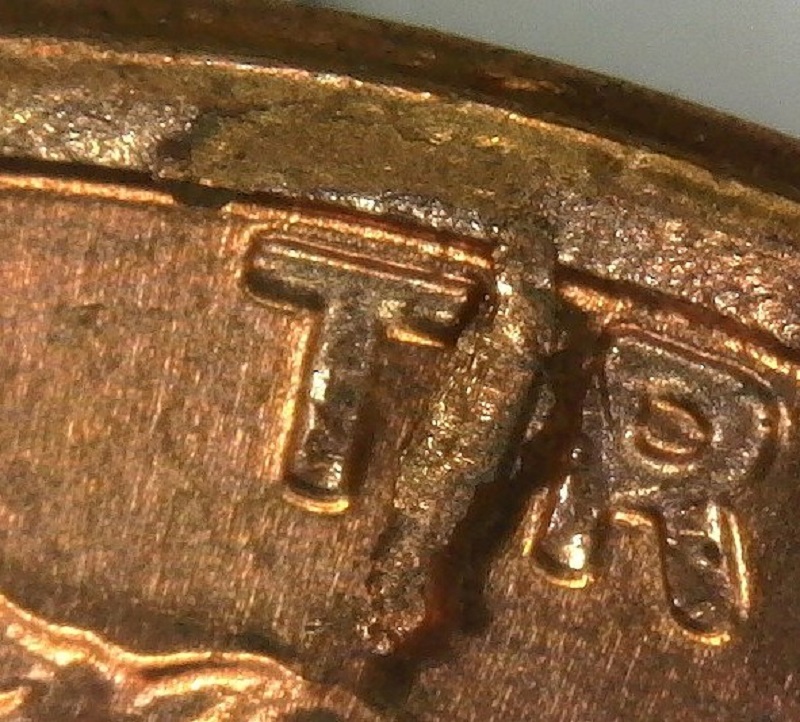 1974-D-LMC-BU-Rim-Pulled-Off-Strike-Through?