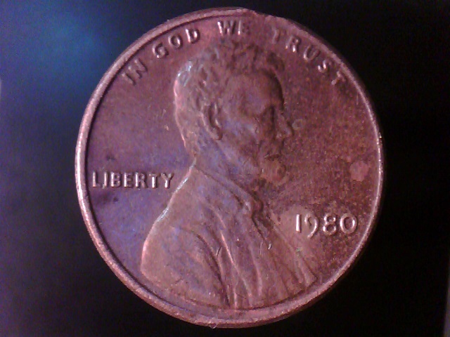 1980-P-Lc--Looks-Like-A-Small-Clip-But-?