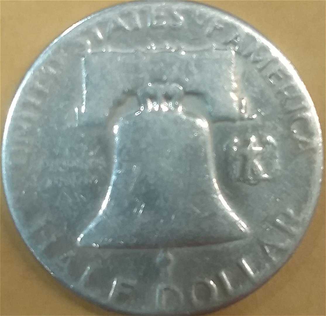 1950-Franklin-Half-Dollar-Grease-Filled-Or-Capped-Die?