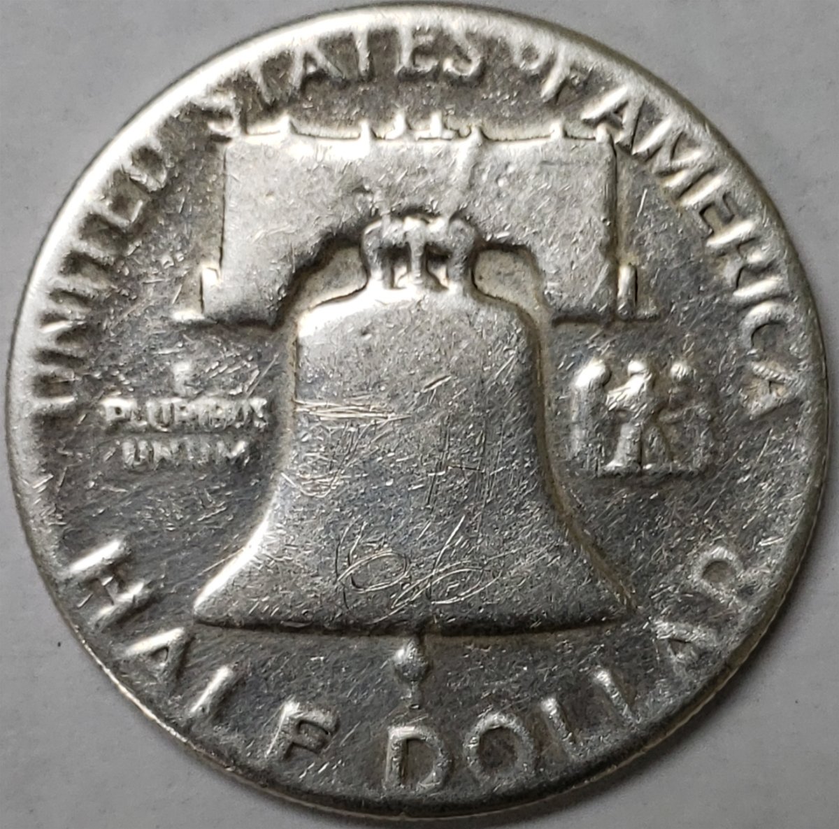 1950-Franklin-Half-Dollar-Grease-Filled-Or-Capped-Die?