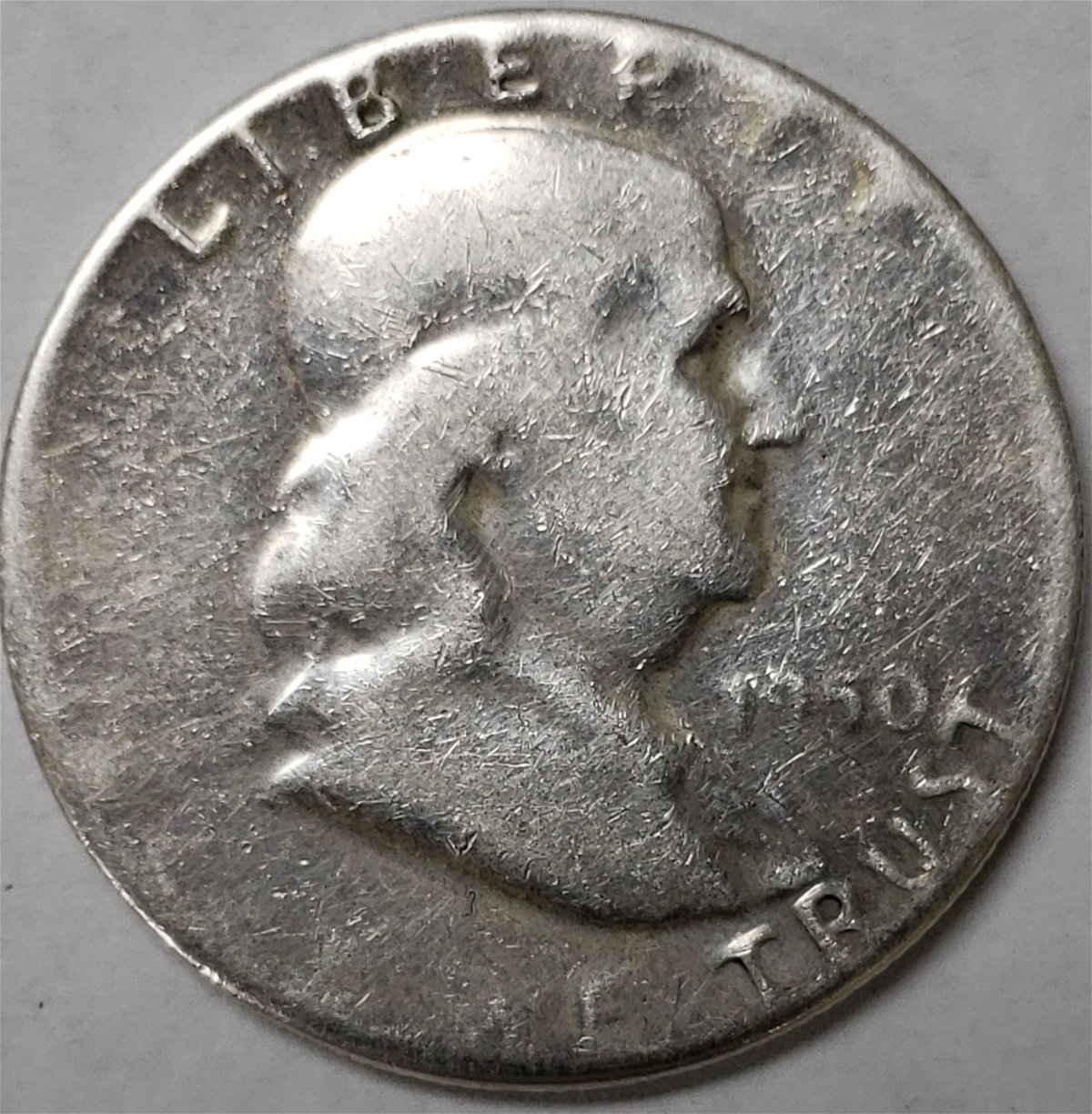1950-Franklin-Half-Dollar-Grease-Filled-Or-Capped-Die?
