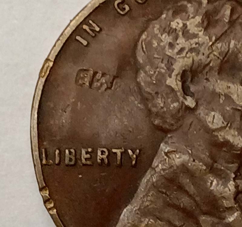 1955-D-Lincoln-Wheat-Cent-Strike-Through-Mint-And-Date-Stamps?