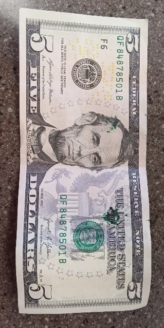 Green-Ink-Splatters-On-A-$5-Bill