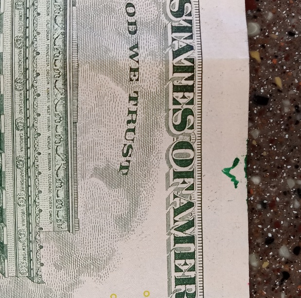 Green-Ink-Splatters-On-A-$5-Bill