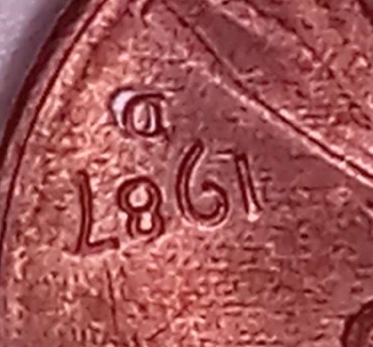 1987-D-Lincoln-Cent.-Is-It-A-Plating-Blister?-Caused-By-Heat-And-Air?