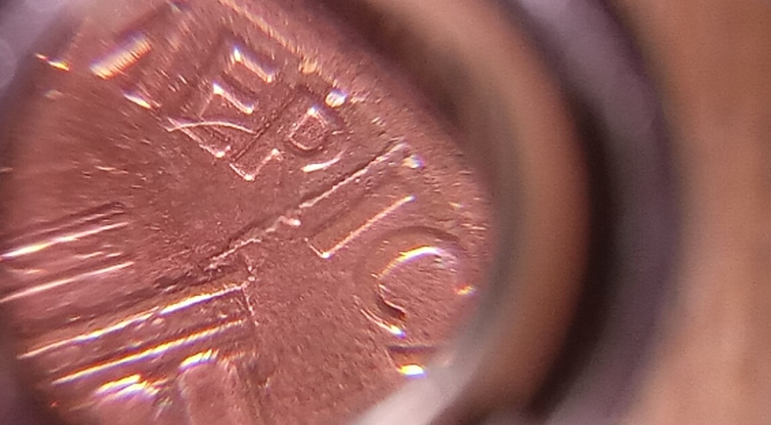 1993-P-1-Cent.-Does-It-Have-A-Die-Crack-On-The-Reverse,-At-2:30?