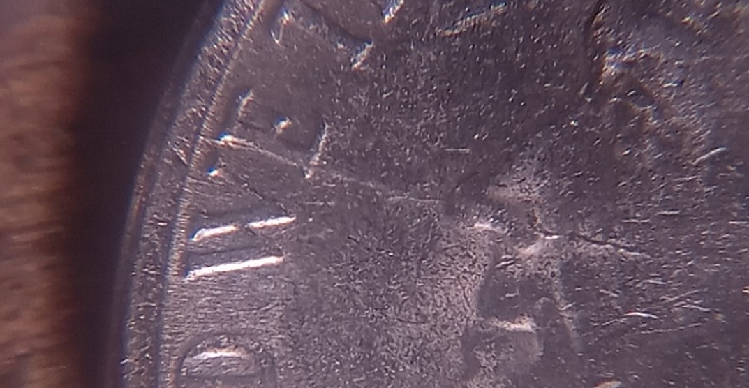 1996-P-5-Cent.-Does-This-Coin-Have-A-Die-Crack-From-Rim-To-Jeff's-Nose?