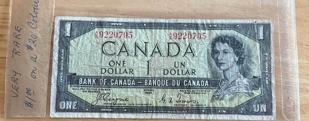 1954-Canadian-1-Dollar-Bank-Note-On-A-$20-Dollar-Colour