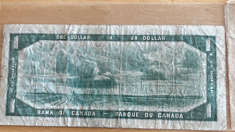 1954-Canadian-1-Dollar-Bank-Note-On-A-$20-Dollar-Colour