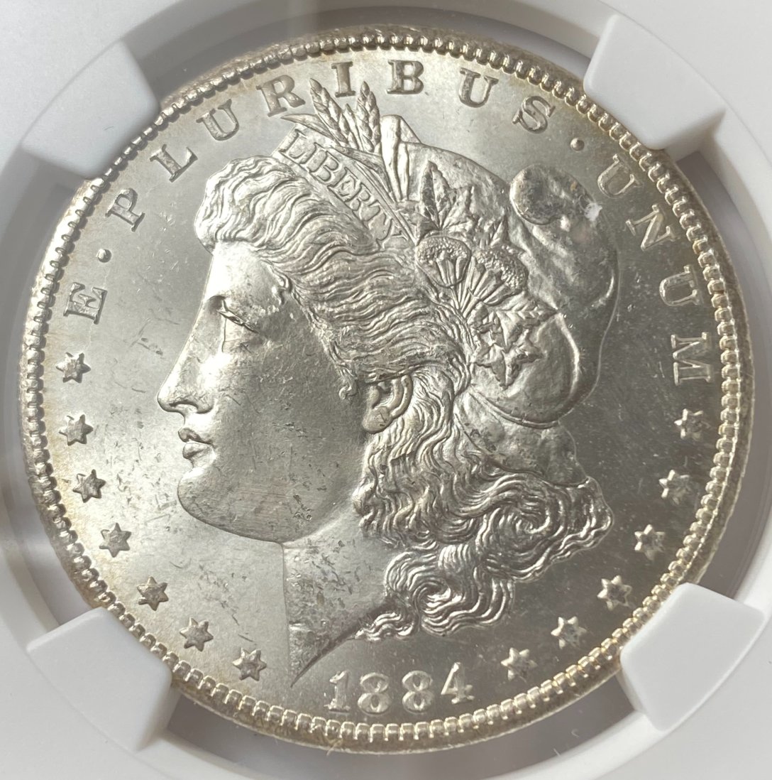 1884-CC-$1-Morgan-Silver-Dollar.-You-Vs.-NGC!