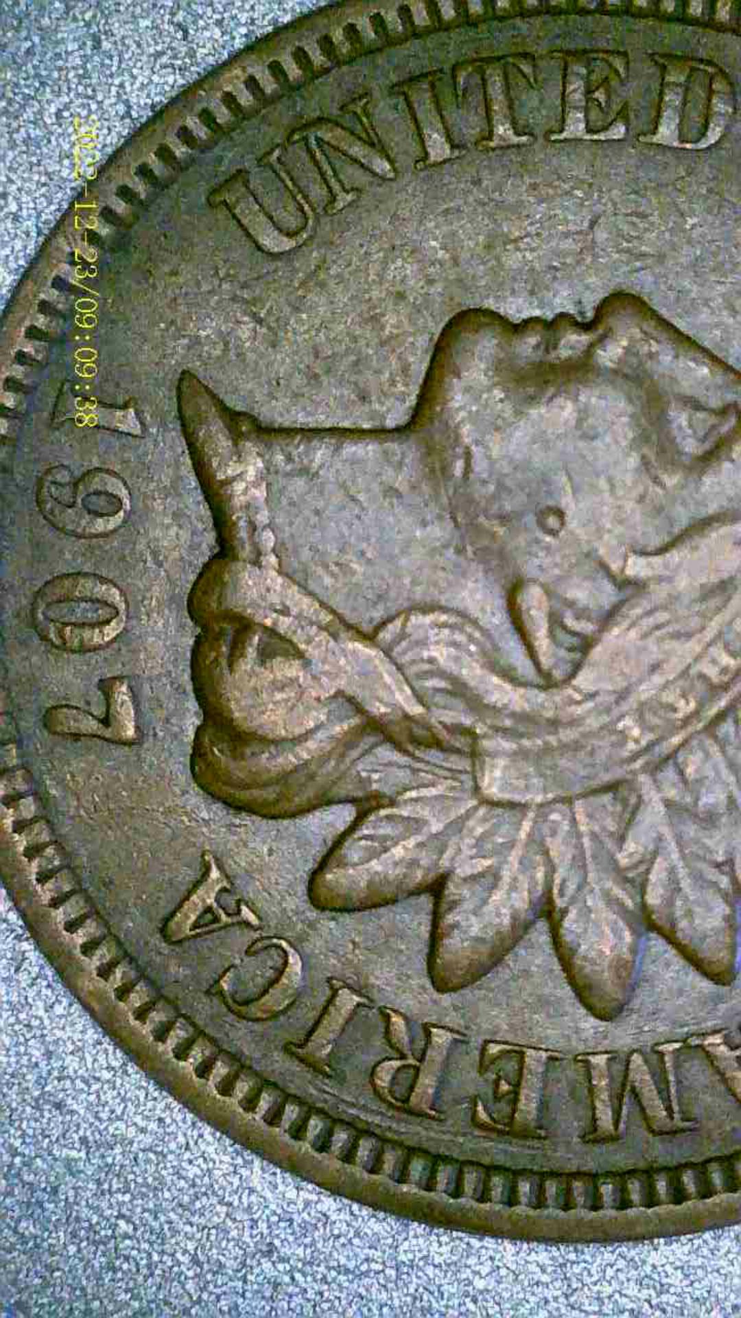 1907-Indian-Head-Penny-With-An-L-And-Doubling-On-Reverse